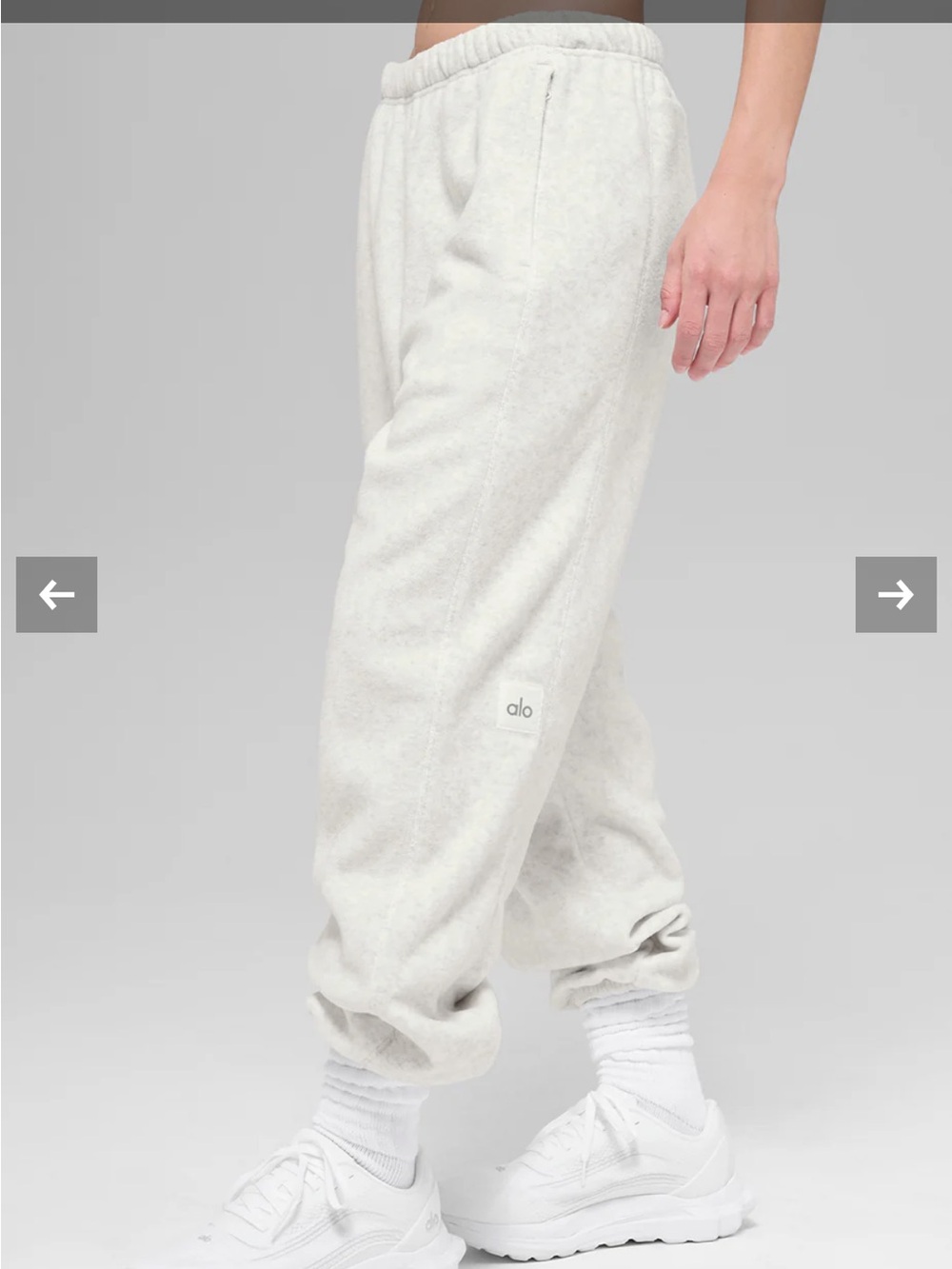ALO Yoga polar fleece high-waist retreat jogger in white heather grey.